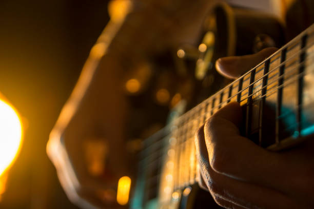 istock Play the guitar, close up 905296214