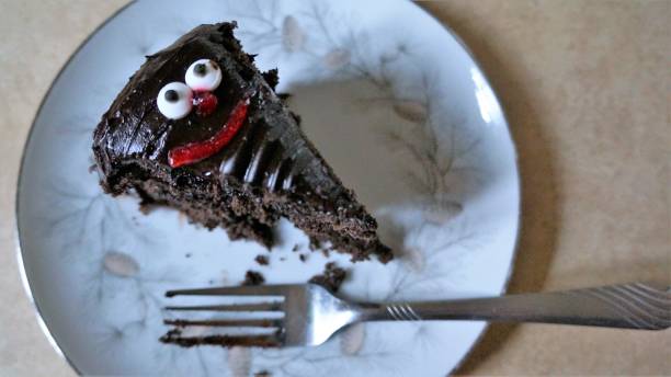 istock Happy Slice of Chocolate Cake 905296288
