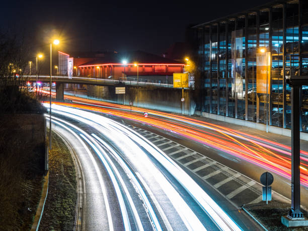istock car traffic at night in neu-ulm, germany 905296312