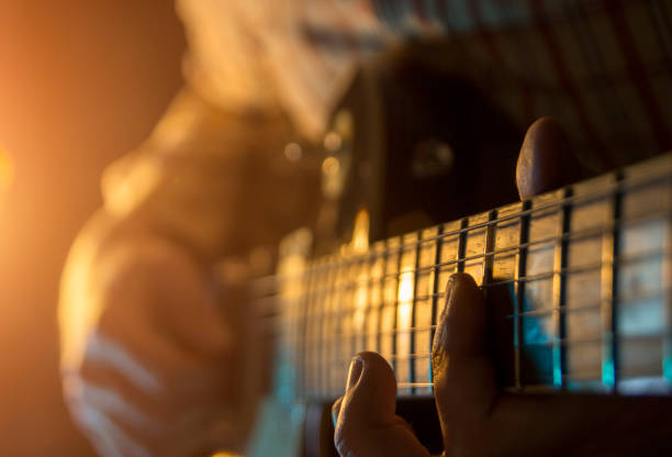 istock Play the guitar, close up 905296546