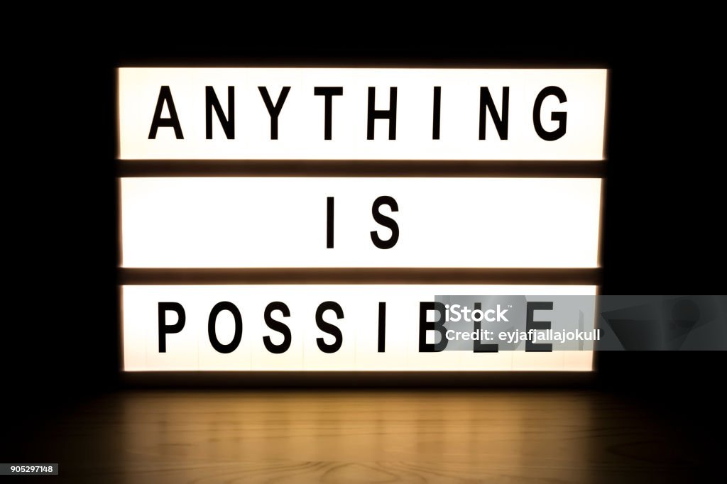 Anything is possible light box sign board Anything is possible light box sign board on wooden table. Possible Stock Photo