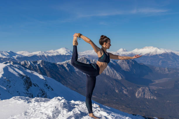 A woman practices Natarajasana