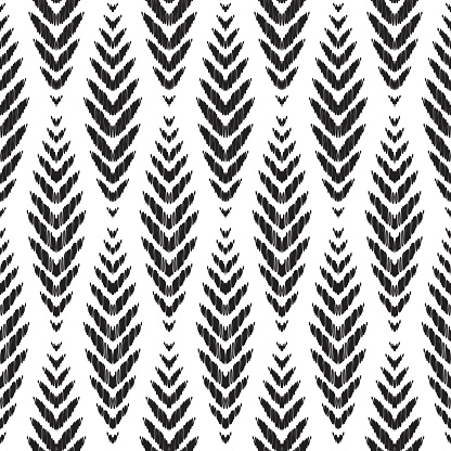 Seamless pattern for home decor ideas. Ikat chevron wallpaper. Ethnic, indian, aztec fashion style. Pillow textile decoration. Tribal vector background. Black and white graphic design.