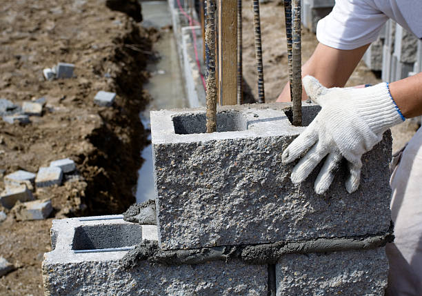 Placing Cinder Blocks stock photo