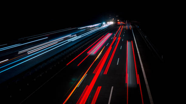 istock Traffic on highway - long exposure, motion blur 905312184