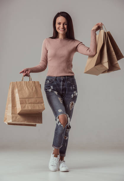 istock Girl with shopping bags 905314622