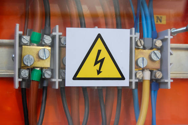 istock High voltage sign. Electrical relays and wires. 905314968