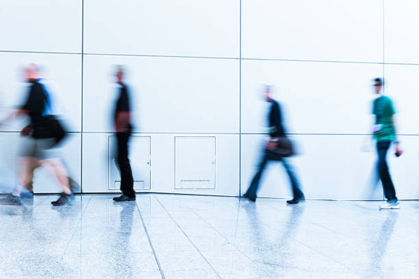 istock blurred people in a clean business environment 905314988