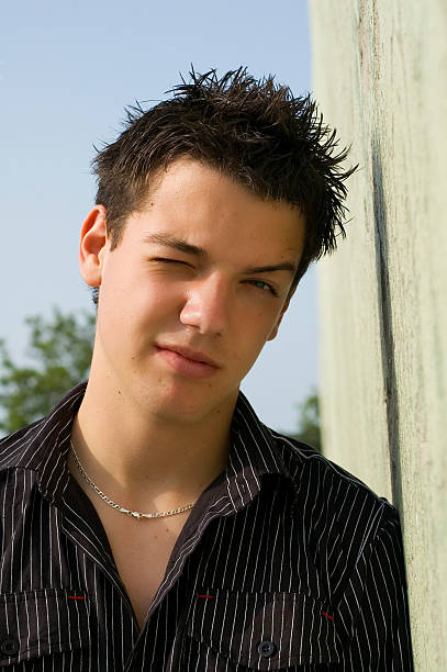 istock teenager give a wink 90531499
