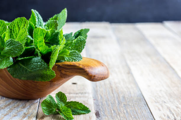 istock Bunch of Fresh green organic mint leaf 905318120