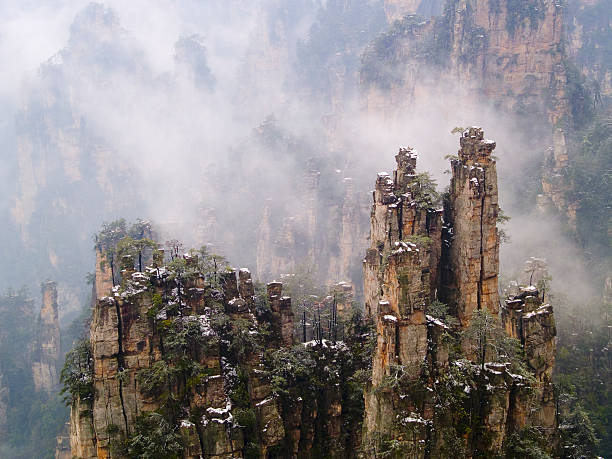 istock Jagged rocks in the Sea of Clouds 90532130