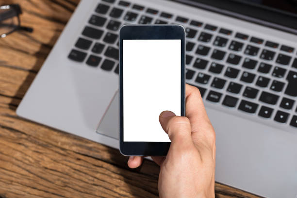 istock Businessperson Holding Smart Phone 905323230