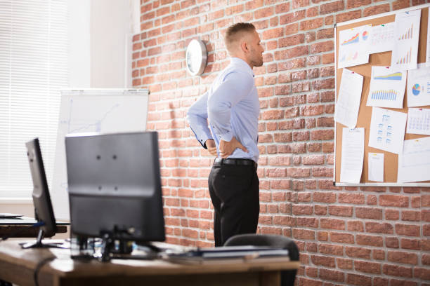 istock Businessman Having Back Pain In Office 905323386