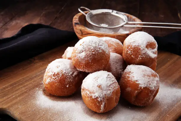 German donuts.  berliner or quarkbällchen with jam and icing sugar