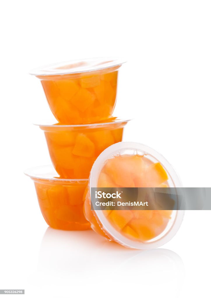 Coupes simples avec peach en gelée de fruits - Photo de Tasse libre de droits