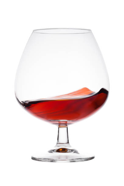 istock Elegant glass with brandy cognac alcohol drink 905328614