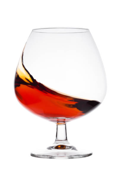 istock Elegant glass with brandy cognac alcohol drink 905328712