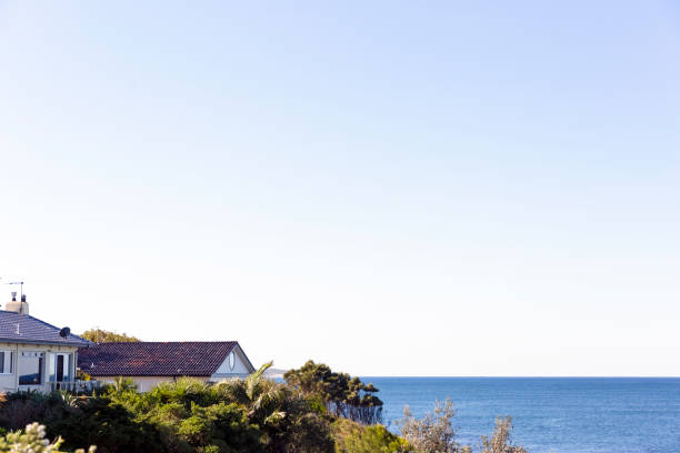 istock Town nad ocean, background with copy space 905330056