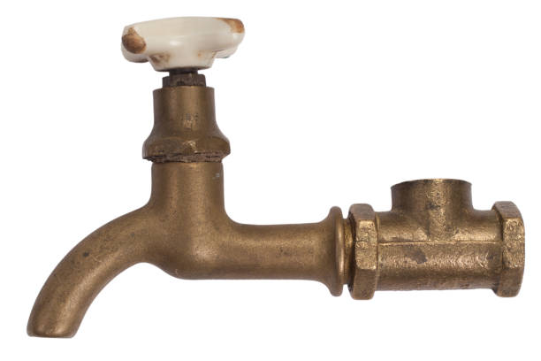 istock Ancient vintage bronze tap isolated on white. 905332210