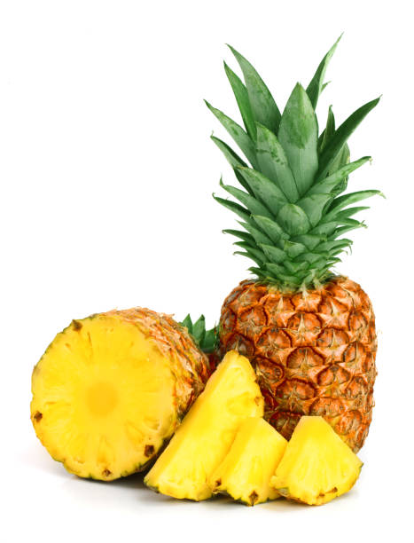 istock pineapple with slices isolated on white background 905335828