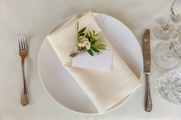istock Decoration and table appointments in restaurant or cafe for lunch, dinner or celebrating marriage, wedding and other event and party. Beautiful table setting 905336746