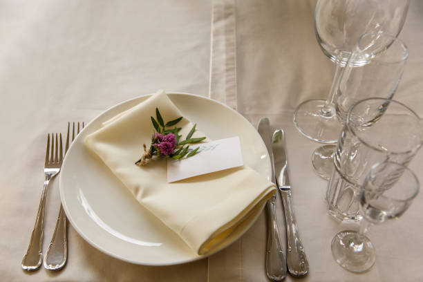 istock Decoration and table appointments in restaurant or cafe for lunch, dinner or celebrating marriage, wedding and other event and party. Beautiful table setting 905337042