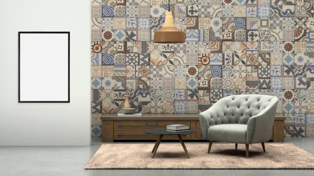 istock Blank picture frame on gray wall with armchair in front 905347632