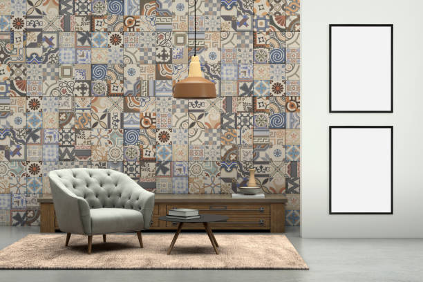 istock Blank picture frame on gray wall with armchair in front 905347642