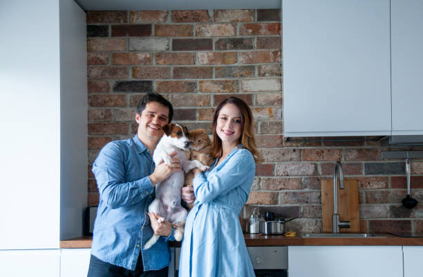 istock young family with pets 905347774