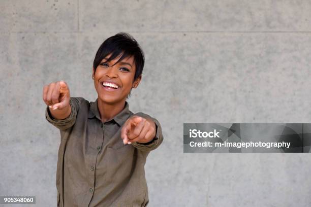 Cheerful Young Black Woman Pointing Fingers With Copy Space Stock Photo - Download Image Now