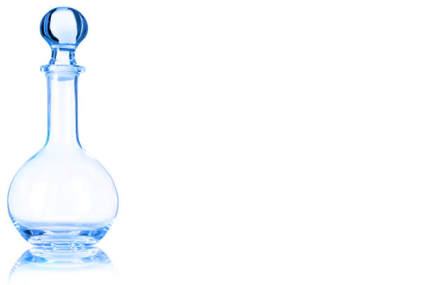 istock Empty glass decanter toned in blue color. 905348710