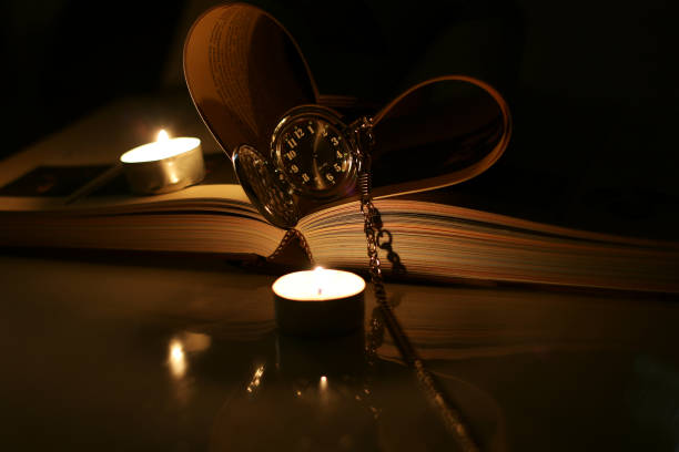 istock book pocket watch candles 905351164