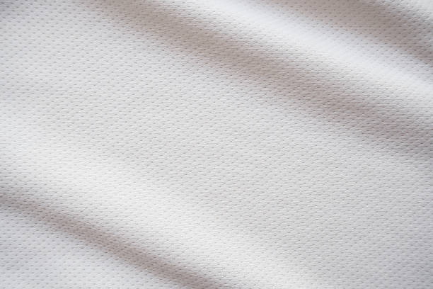 fond de texture tissu maillot de sport blanc - jersey en matière textile photos et images de collection