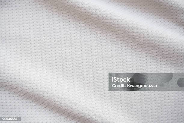 White Sports Jersey Fabric Texture Background Stock Photo - Download Image Now - Textured, Textile, Jersey Fabric
