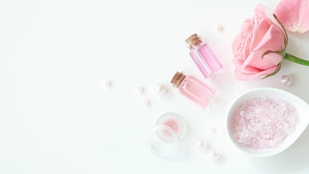 istock Aromatherapy. Small glass bottles with cosmetic oils. Bath salt 905361524