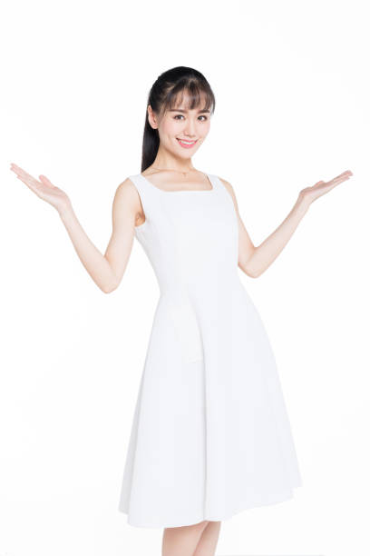 beautiful woman with hands out standing over white background