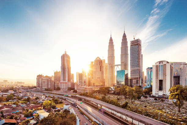 modern buildings in midtown of modern city modern buidlings and elevated road in midtown of kuala lumpur at sunrise kuala lumpur stock pictures, royalty-free photos & images