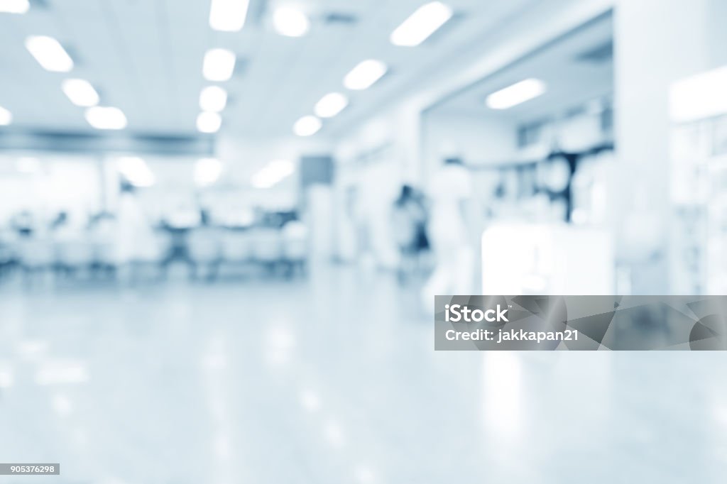 medical background Blurred interior of hospital or clinical with people - abstract medical background. Backgrounds Stock Photo