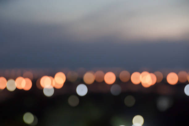 City light bokeh blur background on twilight sky.