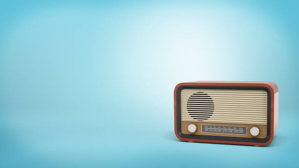 rendu 3d de la radio de style rétro en couleur brun avec un haut-parleur et boutons tuner se tient sur fond bleu - radio haute fréquence photos et images de collection
