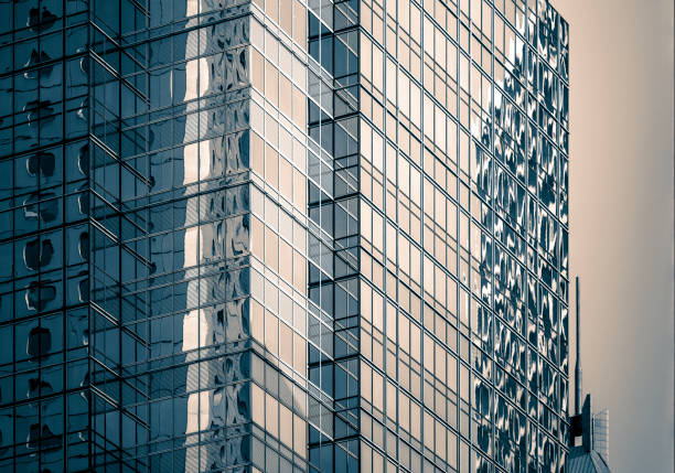 istock Modern office building close up in sunlight 905390258