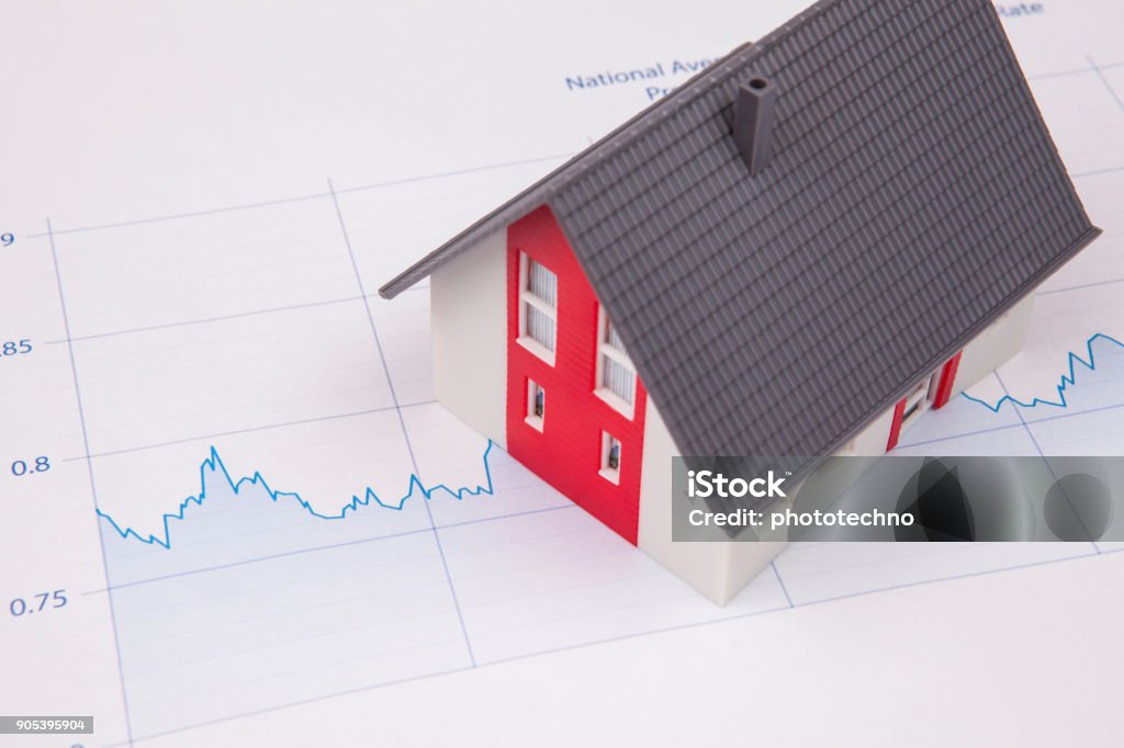 House on A Financial Graph Mortgage Loan Stock Photo