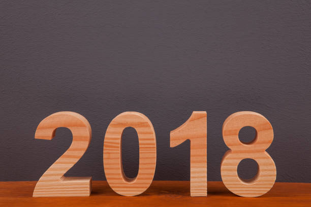 istock New year concepts 2018 with Wooden Numbers 905396152