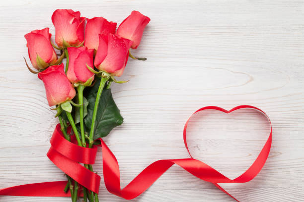istock Valentines day greeting card with red roses 905396674