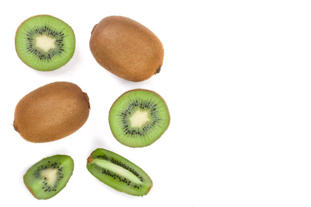 istock Kiwi fruit with slices isolated on white background with copy space for your text. Top view. Flat lay pattern 905397252