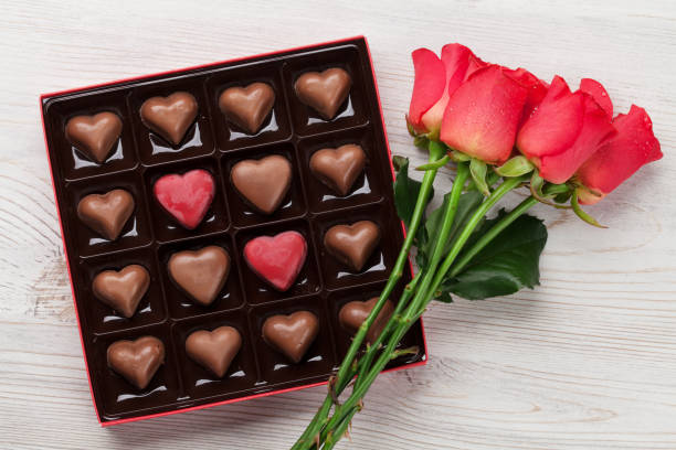 istock Valentines day with red roses and chocolate 905397476