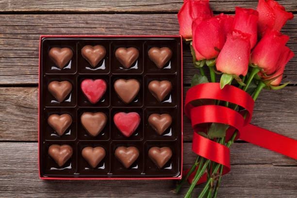 istock Valentines day with red roses and chocolate 905397748
