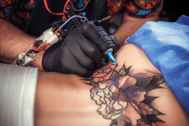 istock Professional tattooist forms a tattoo tattoo parlor 905397876