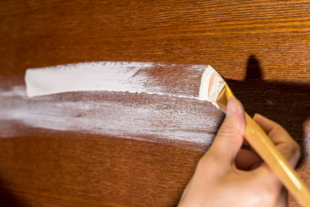 istock Furniture restoration chalk white paint 905401356