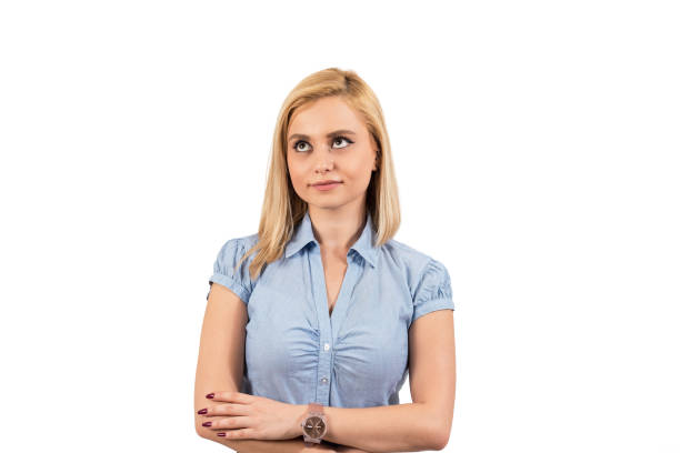 istock Isolated thinking woman looking up on white background with empty copy space 905401380
